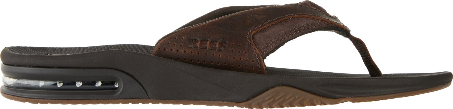 Reef flip flops academy sports online