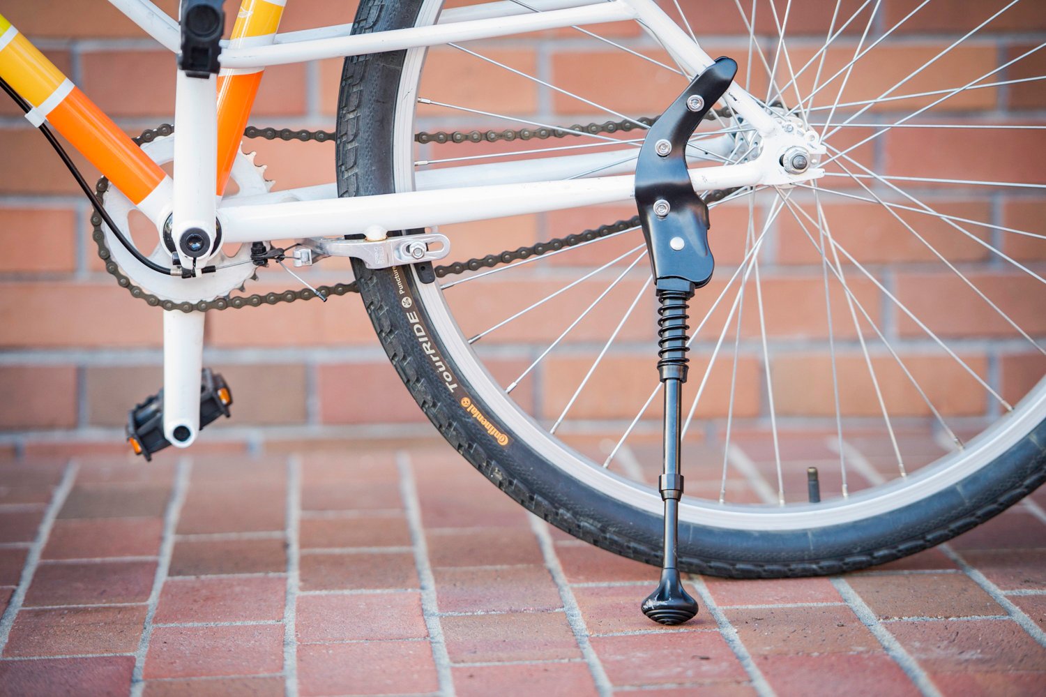 Bell bracer bicycle store kickstands