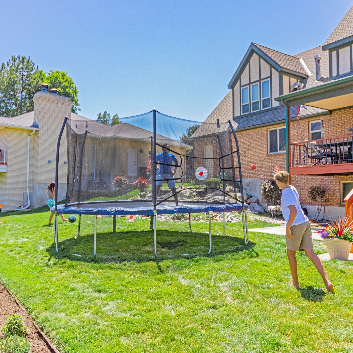 Skywalker Trampolines 15 ft Oval Trampoline with Kickback, Bounce and Navy Spring Pad - view number 2