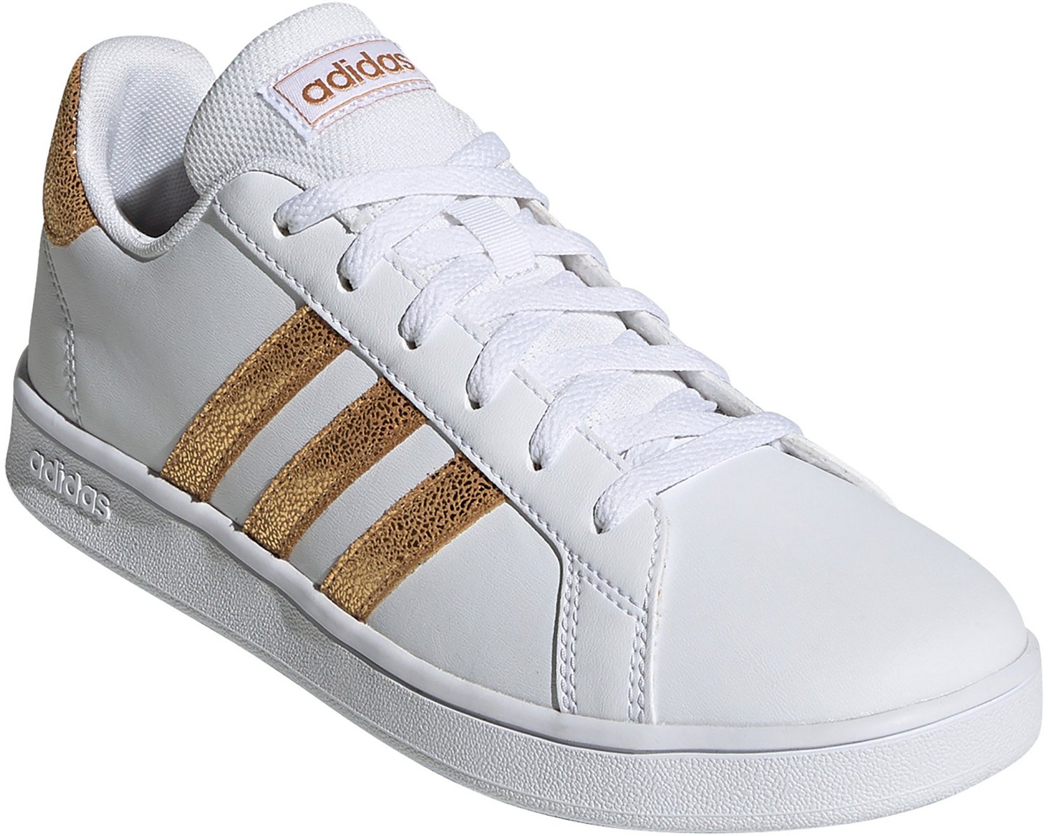 adidas lineas doradas