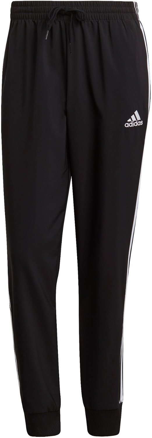 essentials fleece tapered cuff logo pants