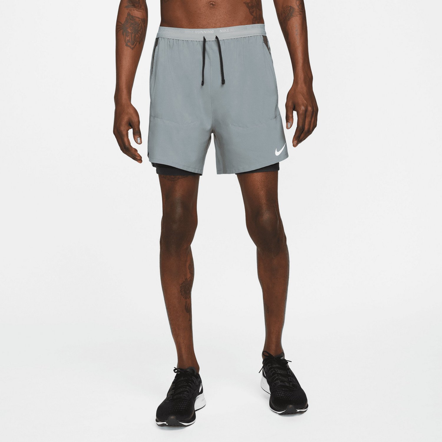 Nike Men s Dri FIT Stride Hybrid Running Shorts 7 in Academy