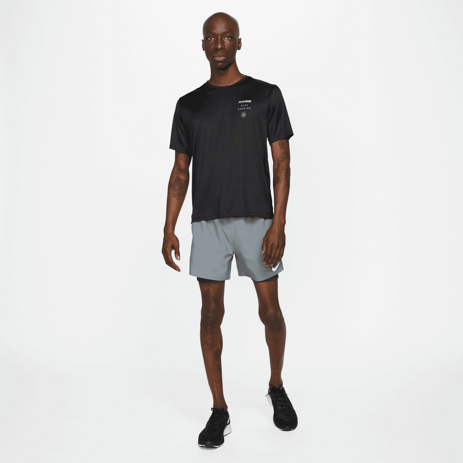 Nike Men's DriFIT Stride Hybrid Running Shorts 7 in Academy