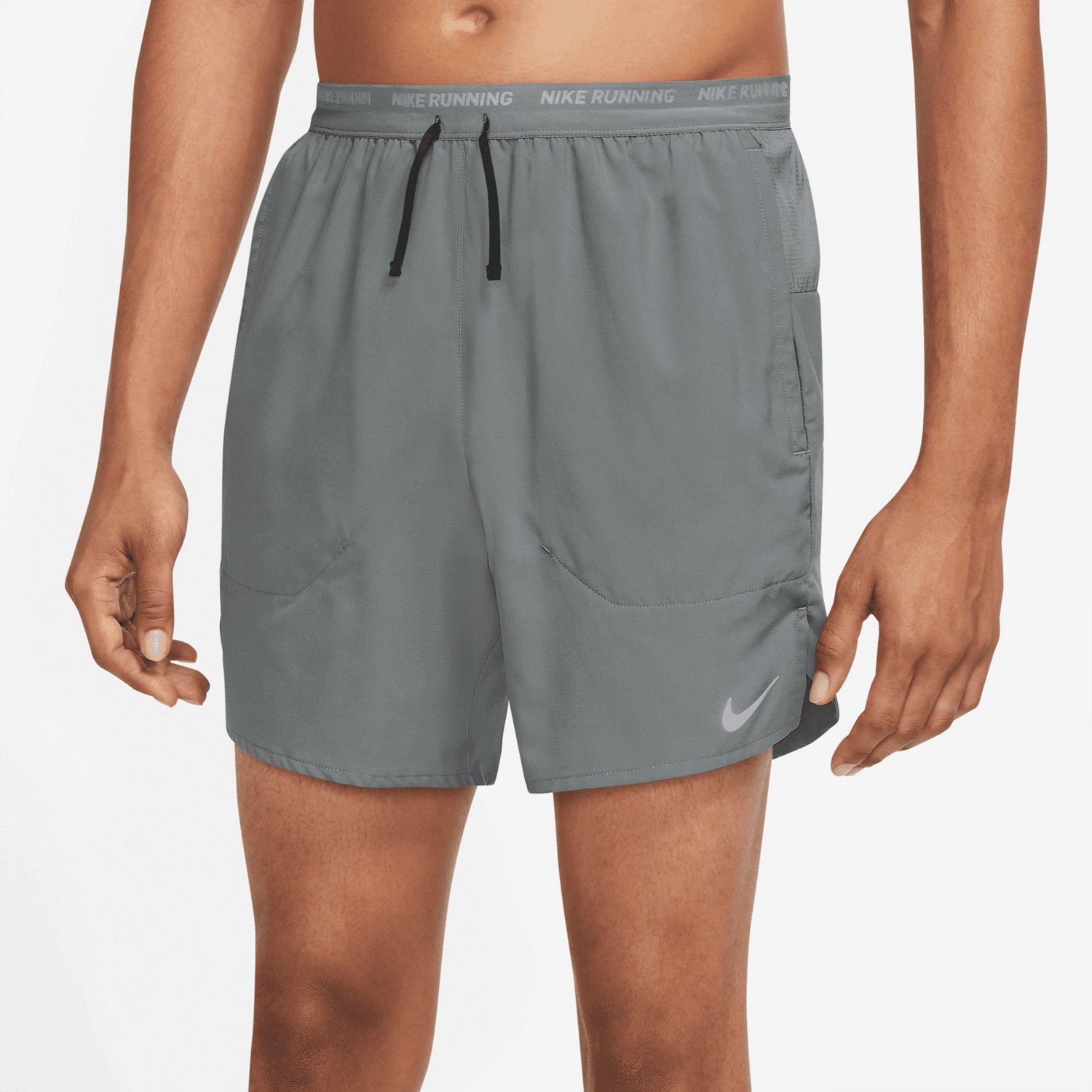Nike Men's DriFIT Stride Unlined Running Shorts 7 in Academy