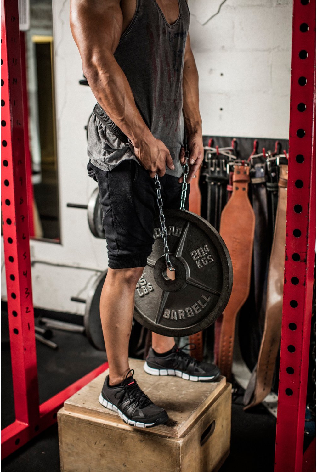 Weighted dip outlet belt