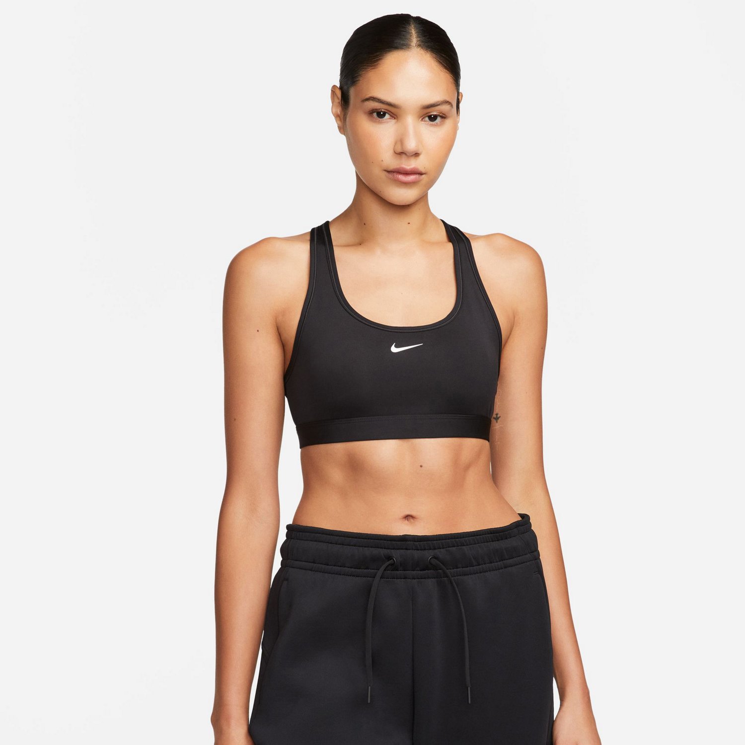 Nike Pro Training light support logo sports bra in black