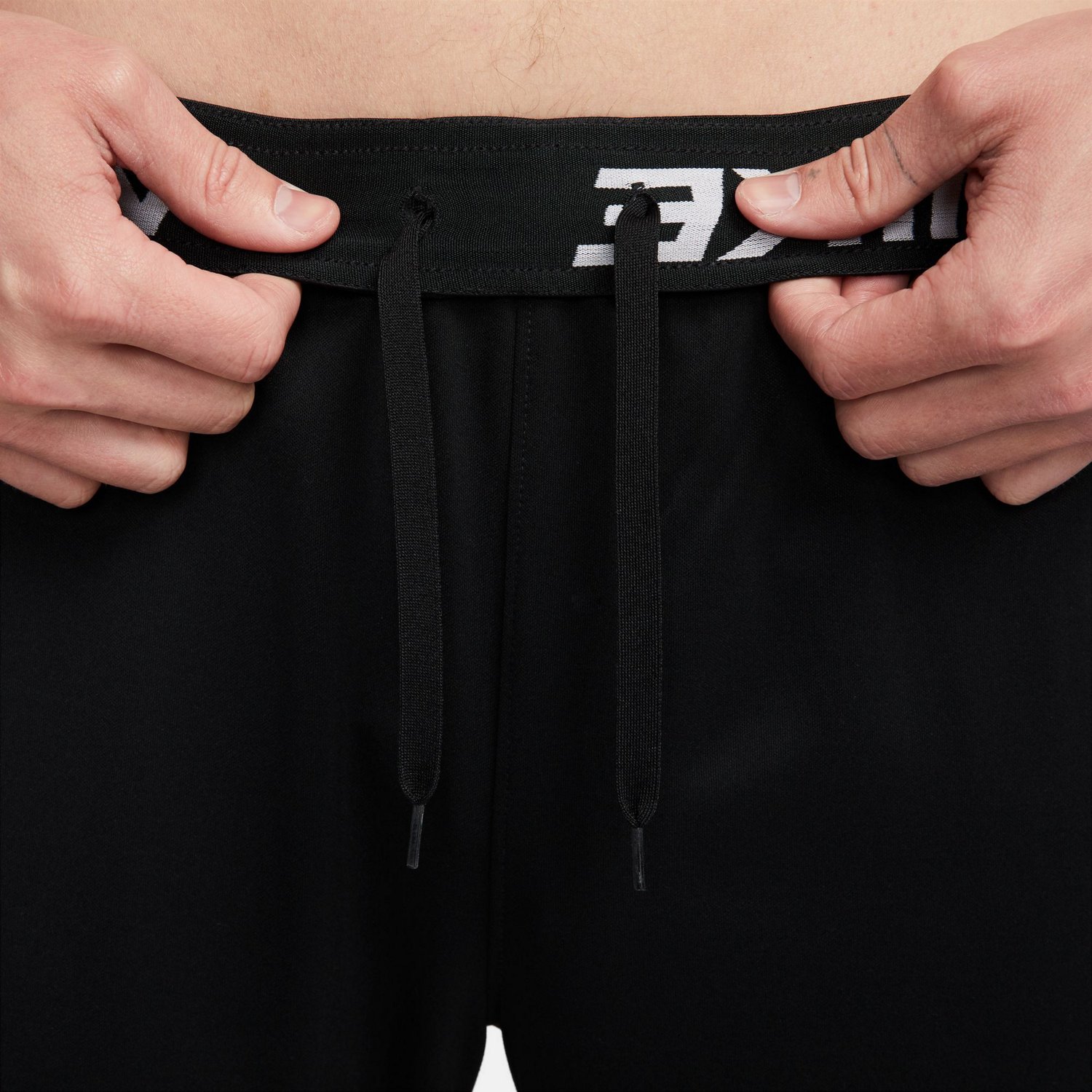 Buy Nike Dri-Fit Tapered Training Pants Men Black, White online
