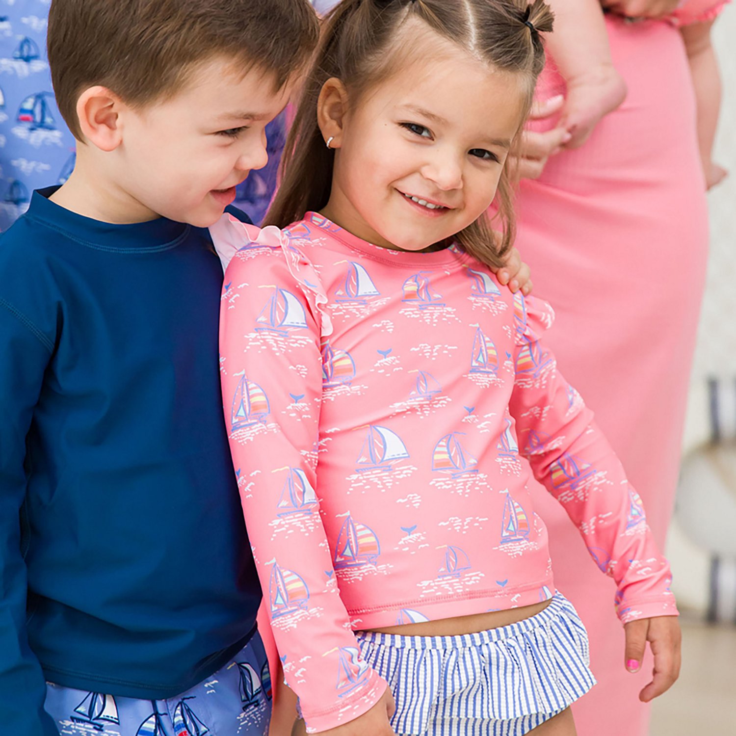 RuffleButts Girls' 4-7 Pink Seas the Day Skirted Flutter Long Sleeve Bikini Rash Guard