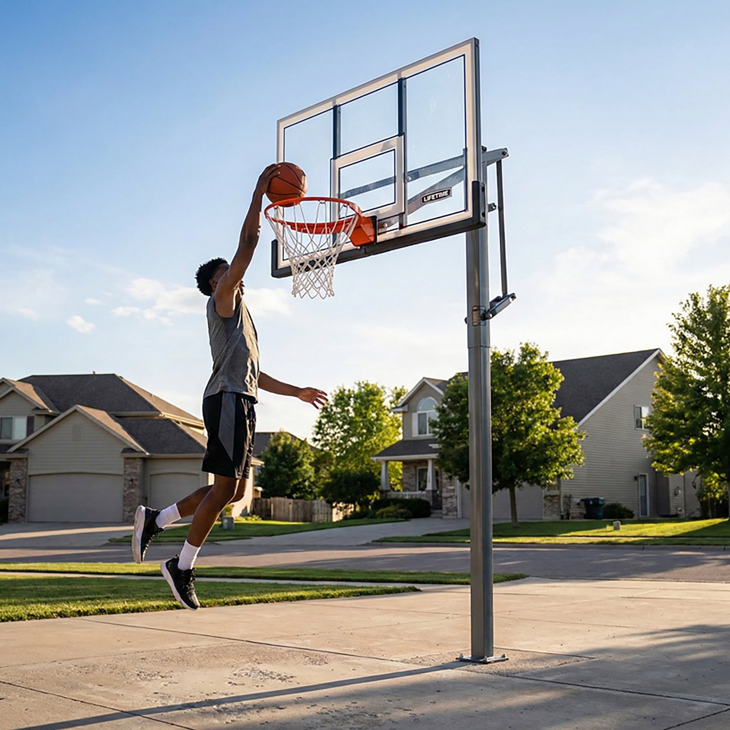 Lifetime Adjustable In-Ground 54 in Acrylic Basketball Hoop
