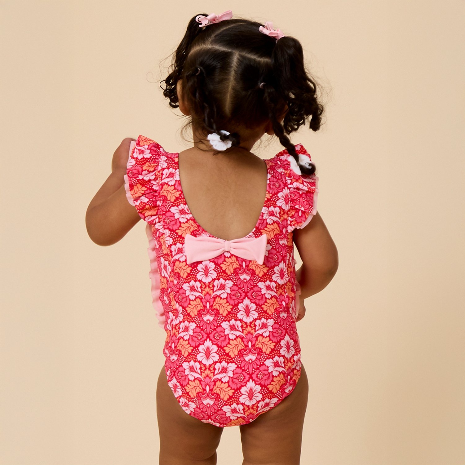 RuffleButts Girls’ Waterfall One Piece Swimsuit