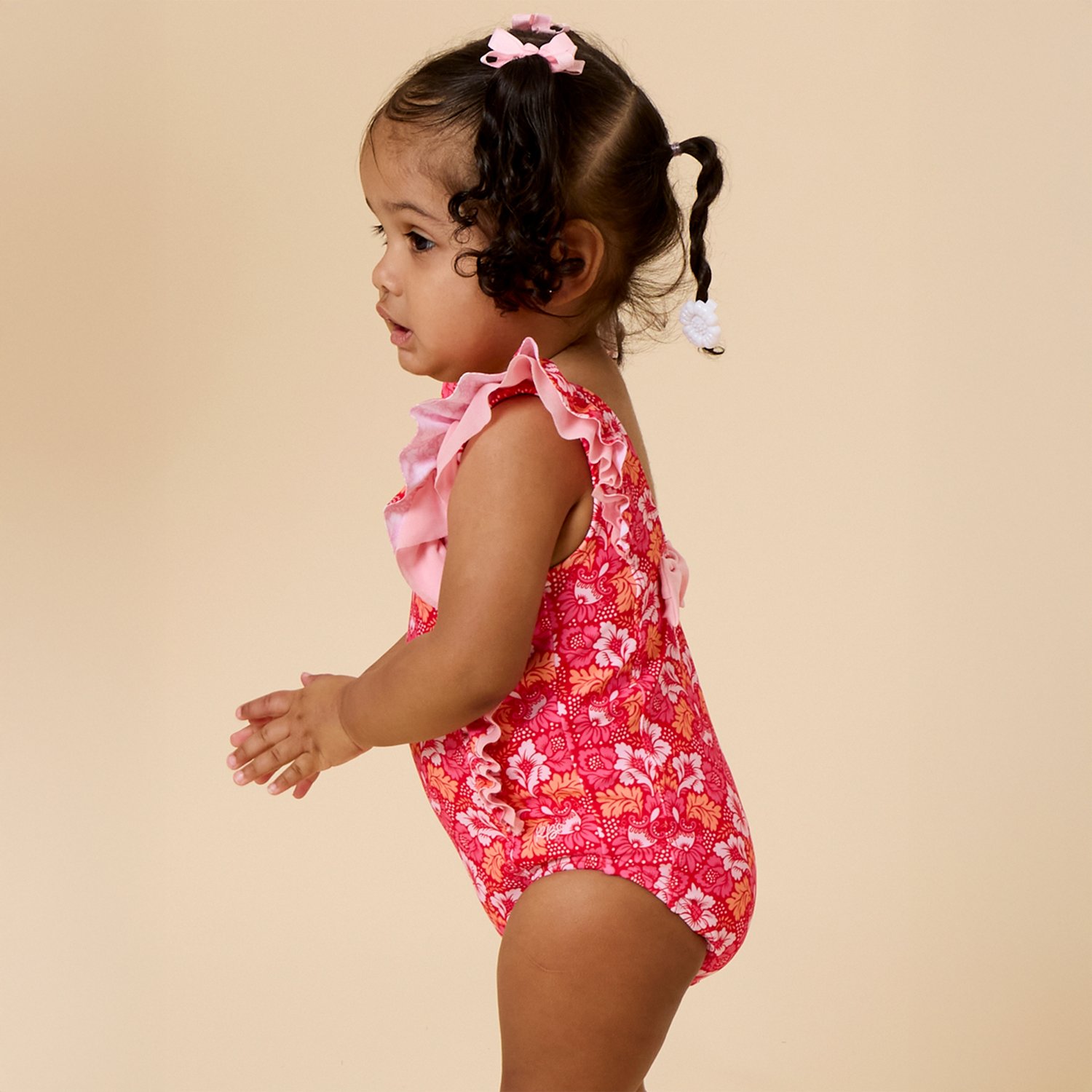 RuffleButts Girls’ Waterfall One Piece Swimsuit