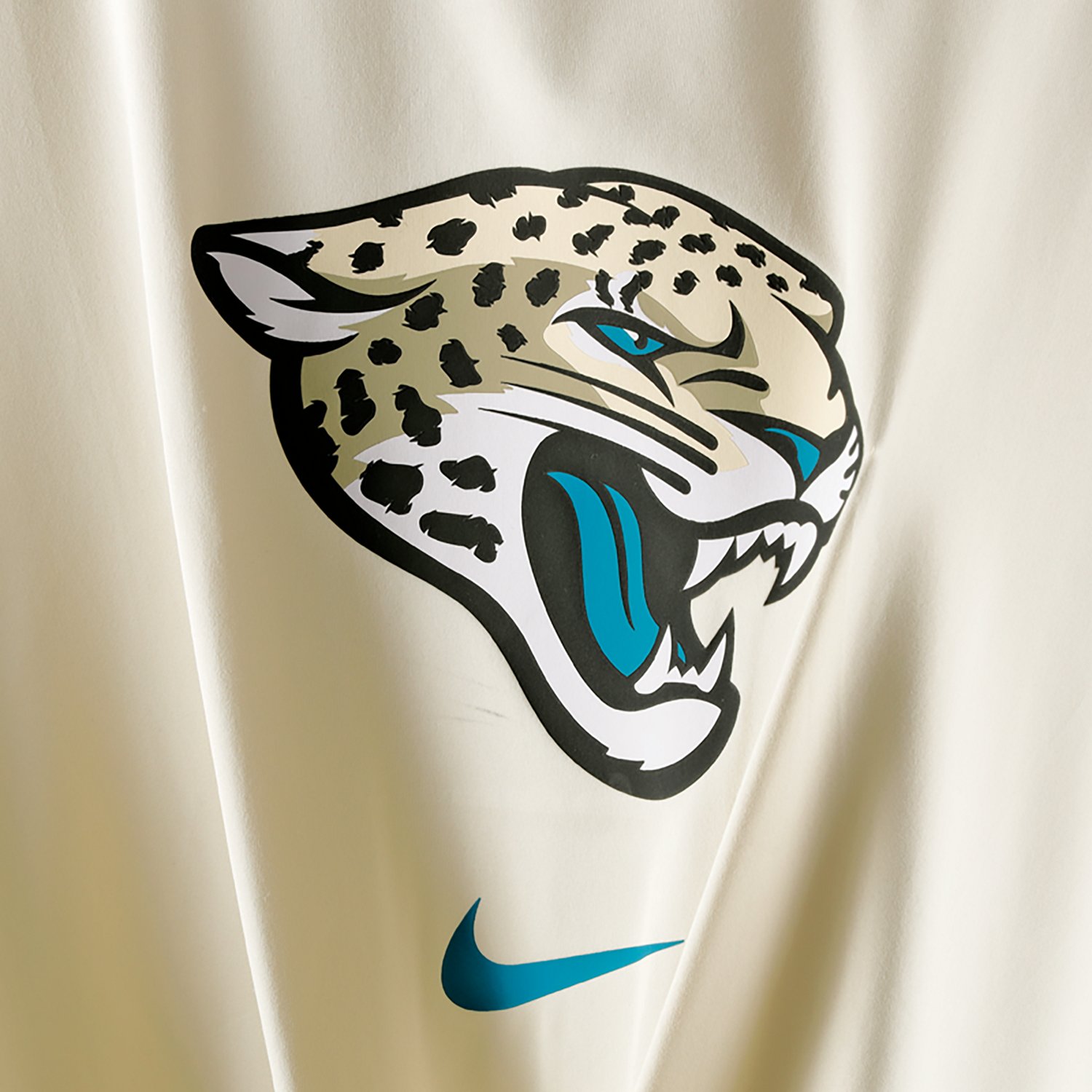 Nike Women's Jacksonville Jaguars Rivalries One Classic Slim Twist Graphic T-shirt