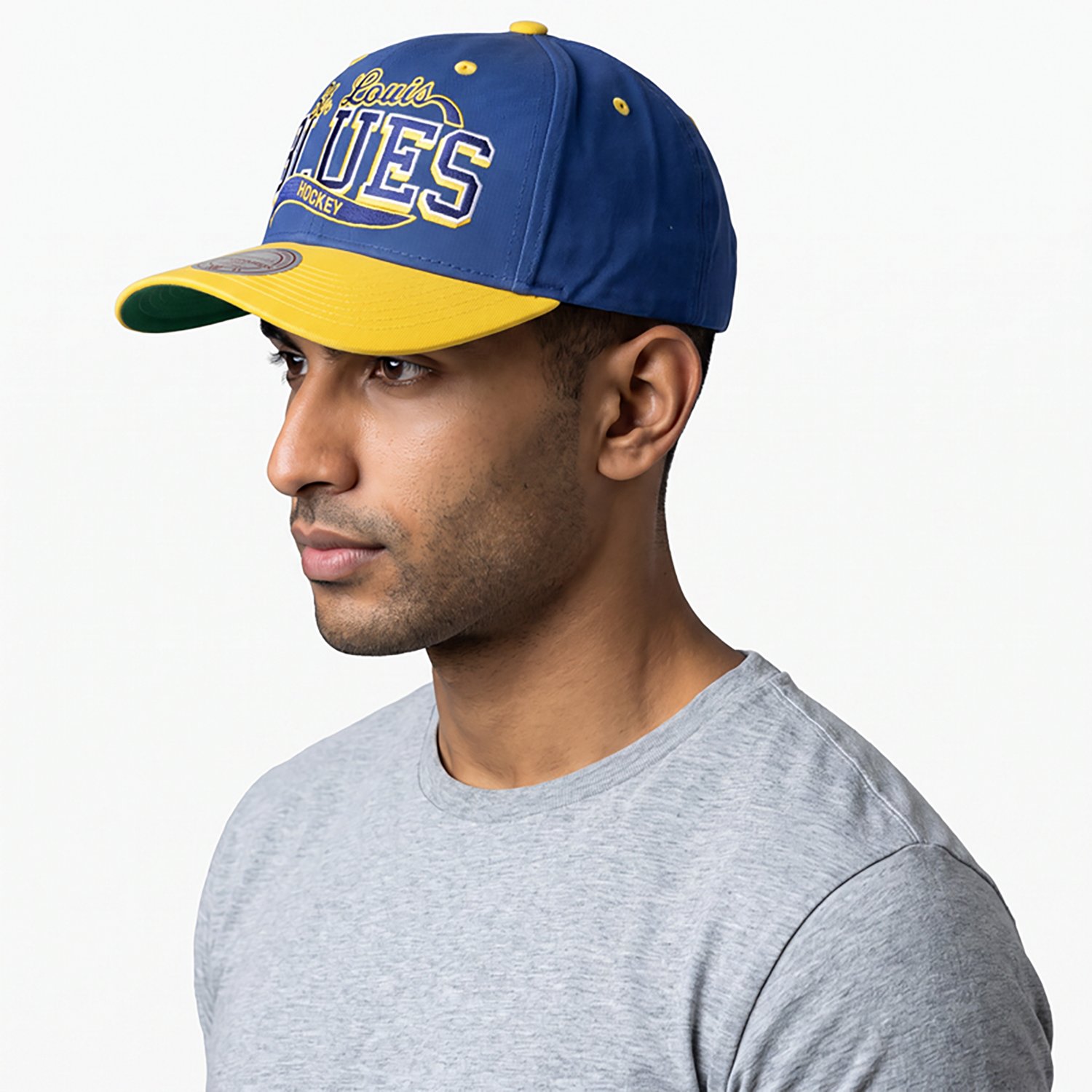Mitchell & Ness Adults' St. Louis Blues Block Sweep Pro Curve Snapback Cap