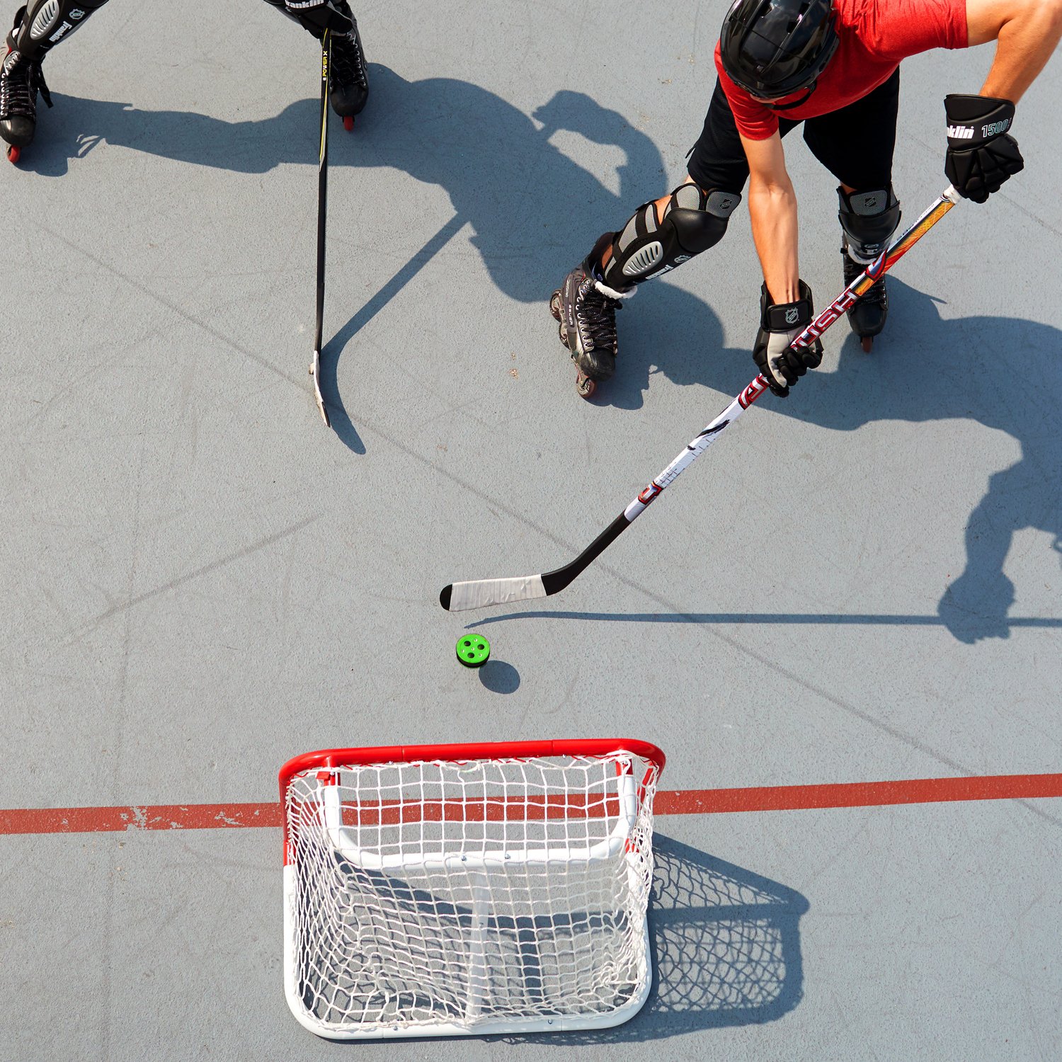 Franklin NHL RollaPuck Training Hockey Puck Academy